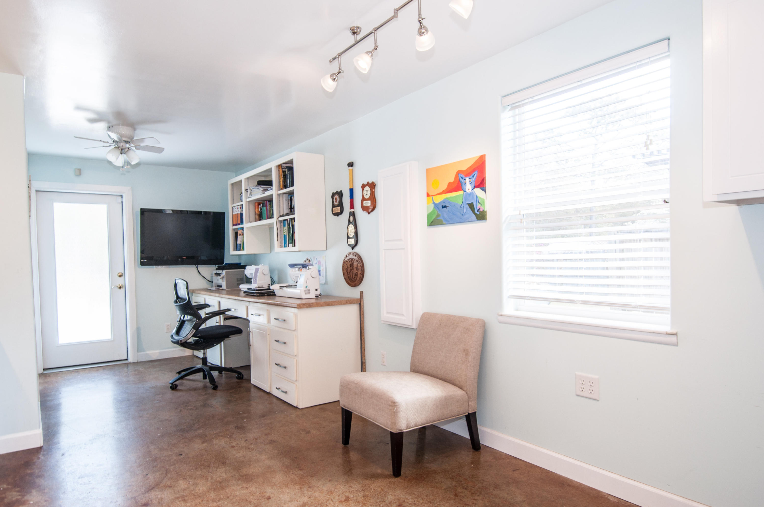 255 Ridge Lake Road Crestview, FL 32536 - Photo 50 of 54 a view of a livingroom with workspace and a window