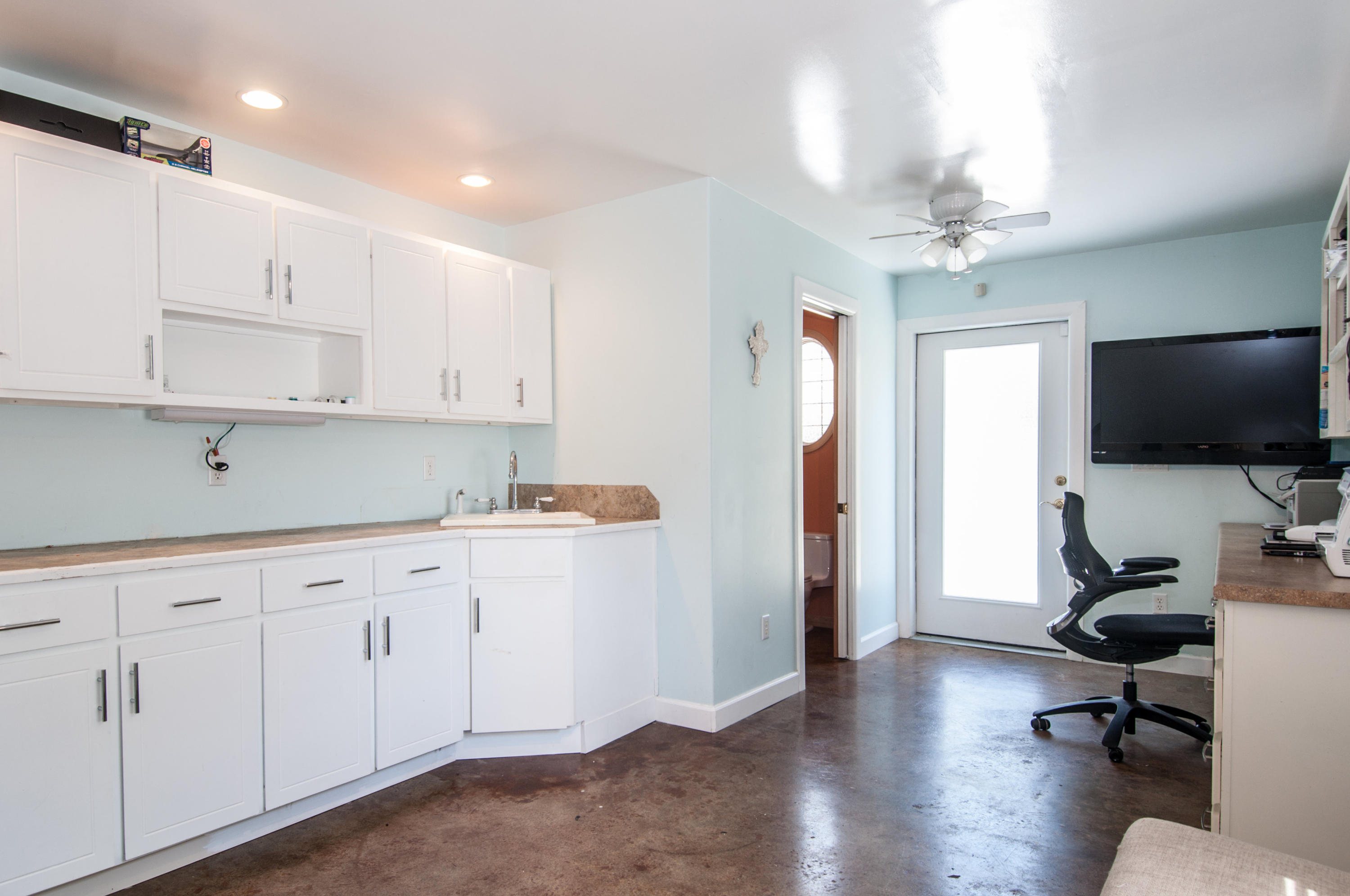 255 Ridge Lake Road Crestview, FL 32536 - Photo 51 of 54 a view of kitchen center island wooden floor and living room view