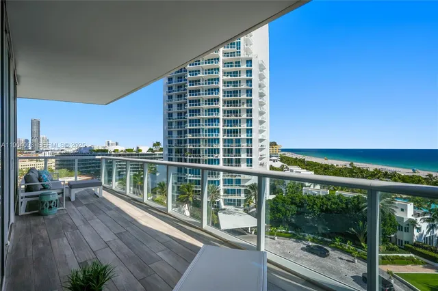 a view of balcony with wooden floor and outdoor space