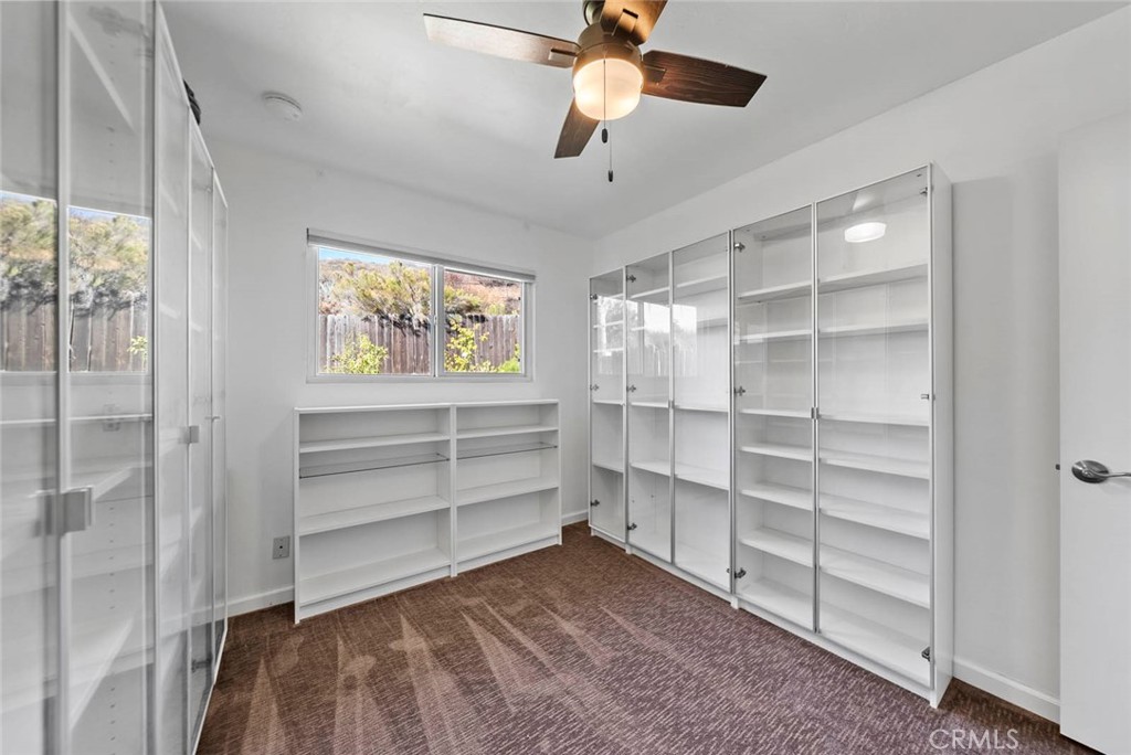 10634 Sanfred Court Santee, CA 92071 - Photo 16 of 44 a view of walk in closet with empty racks