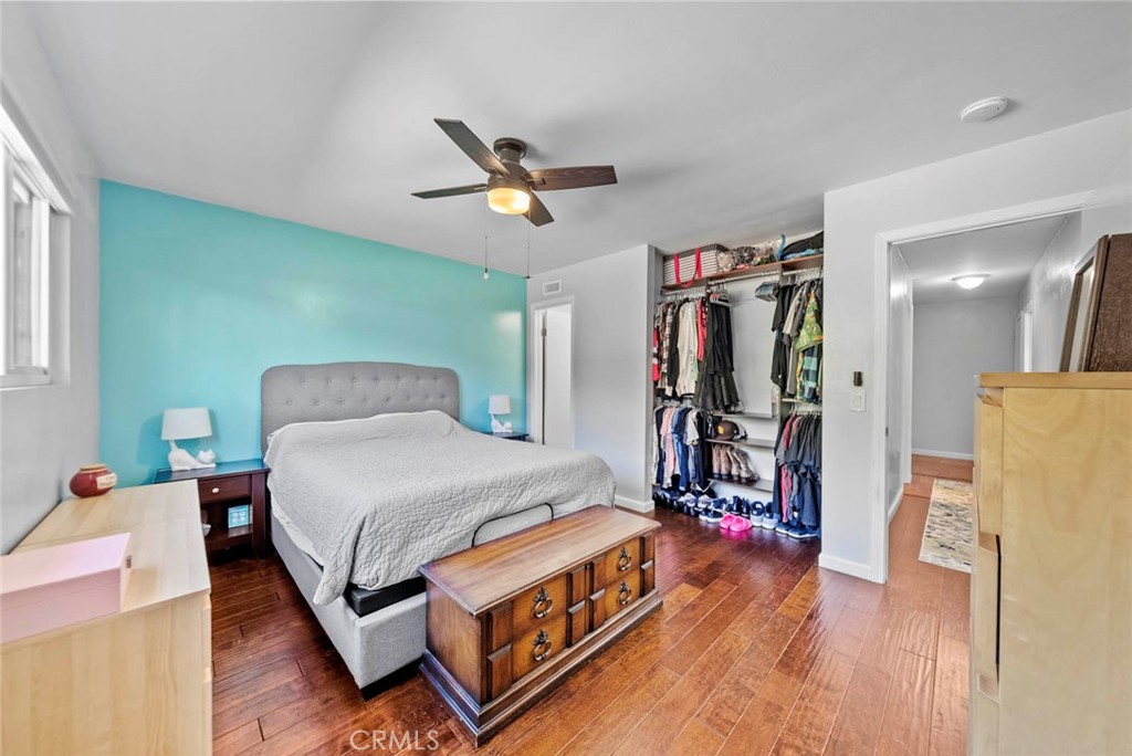 10634 Sanfred Court Santee, CA 92071 - Photo 19 of 44 a bedroom with a bed closet and a mirror