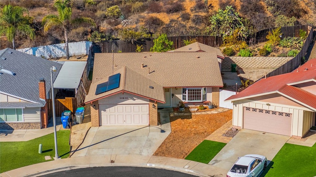 10634 Sanfred Court Santee, CA 92071 - Photo 2 of 44 an aerial view of a house with a yard