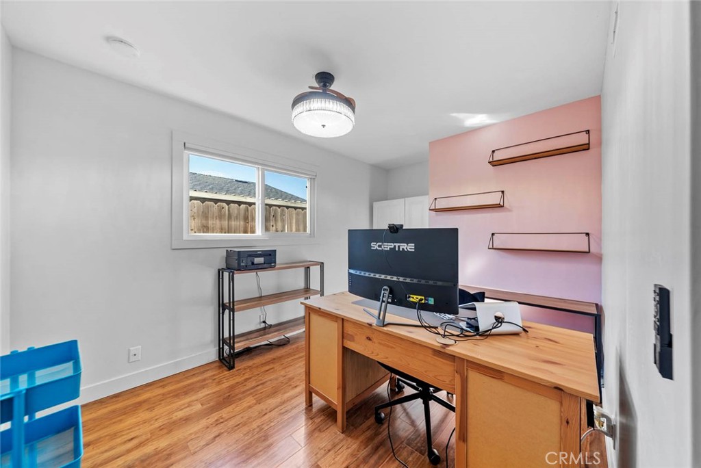 10634 Sanfred Court Santee, CA 92071 - Photo 23 of 44 a view of a workspace with furniture and a window