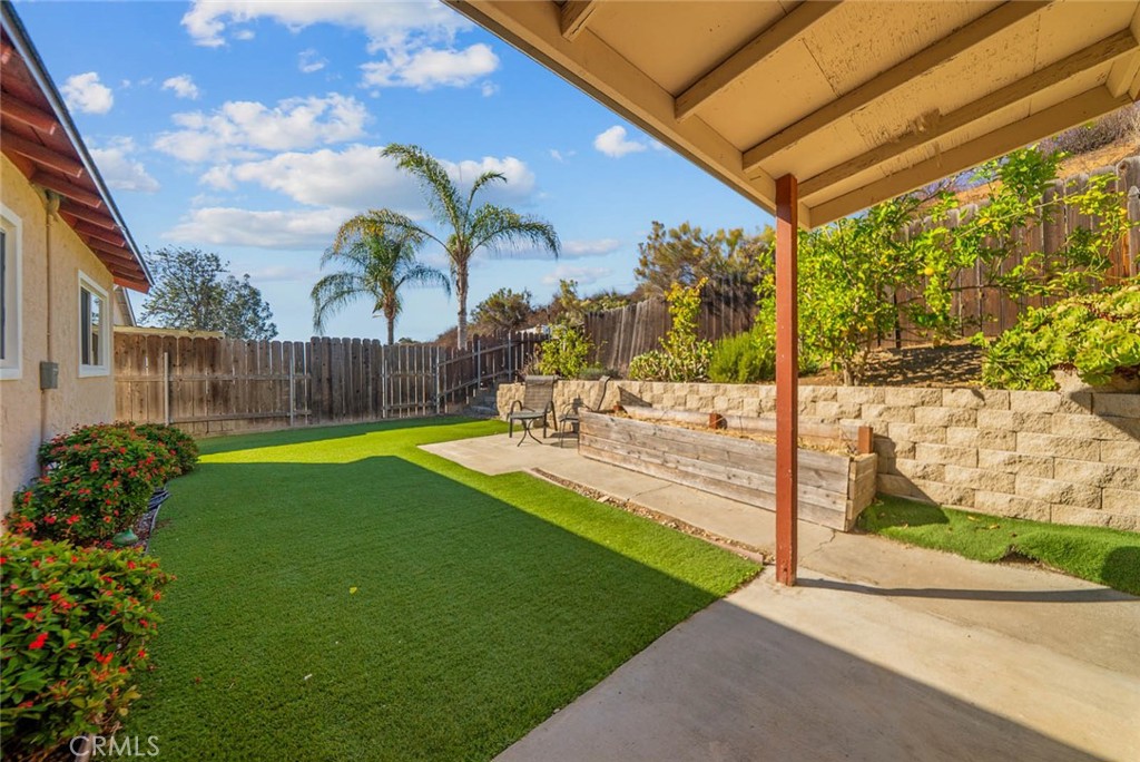 10634 Sanfred Court Santee, CA 92071 - Photo 24 of 44 a view of a backyard with swimming pool