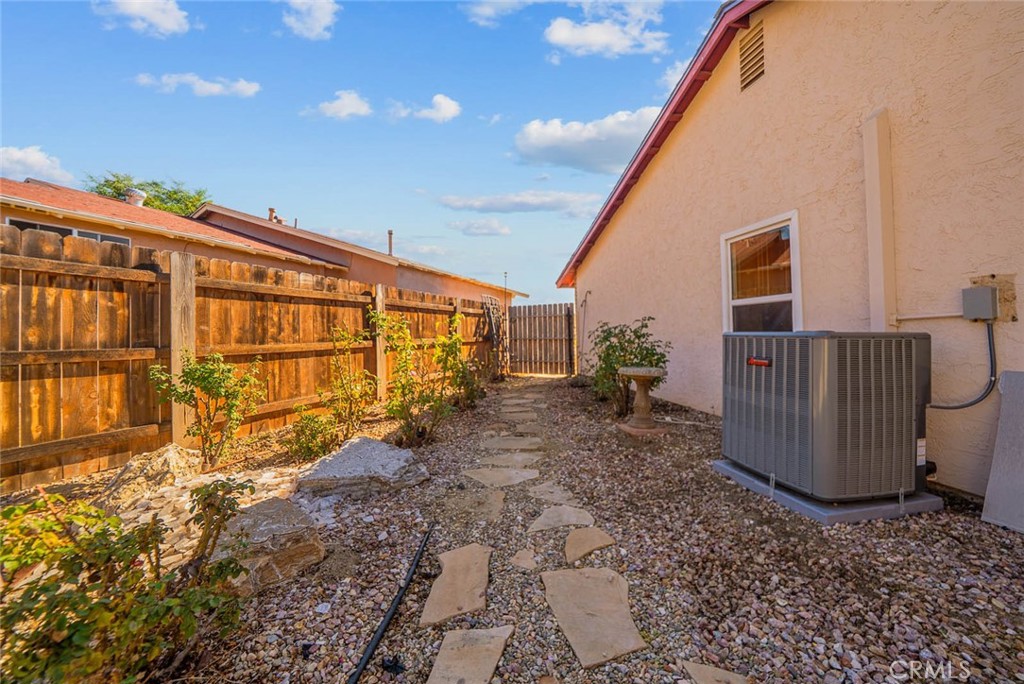 10634 Sanfred Court Santee, CA 92071 - Photo 29 of 44 a view of a blue house with a yard