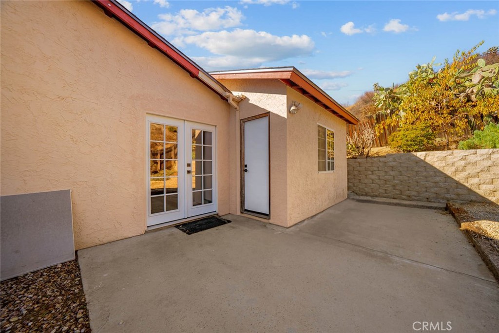 10634 Sanfred Court Santee, CA 92071 - Photo 33 of 44 a view of a house with backyard and parking