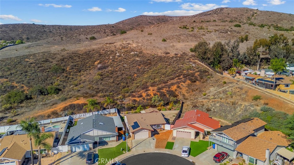 10634 Sanfred Court Santee, CA 92071 - Photo 36 of 44 an aerial view of residential houses with outdoor space