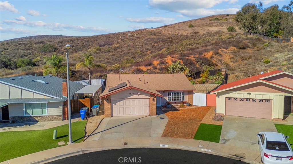 10634 Sanfred Court Santee, CA 92071 - Photo 38 of 44 a view of multiple houses with a road