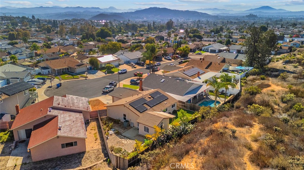 10634 Sanfred Court Santee, CA 92071 - Photo 39 of 44 an aerial view of a city with lots of residential buildings