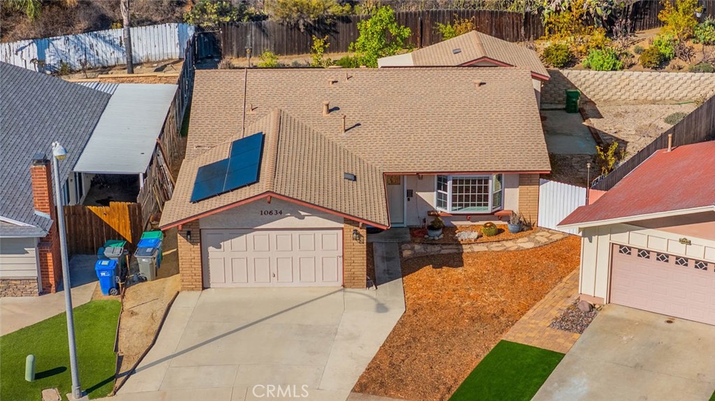 10634 Sanfred Court Santee, CA 92071 - Photo 41 of 44 a front view of a house with a yard