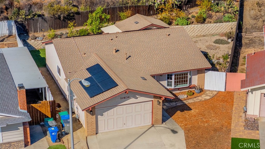 10634 Sanfred Court Santee, CA 92071 - Photo 42 of 44 an aerial view of a house with a yard