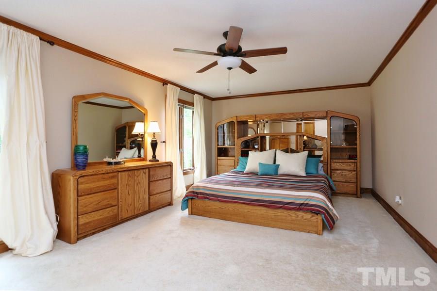 1420 Bascomb Drive Raleigh, NC 27614 - Photo 13 of 23 Very spacious master suite. Lots of room for a king size bed and furntiure. There is a large walk - in closet for all your clothes.