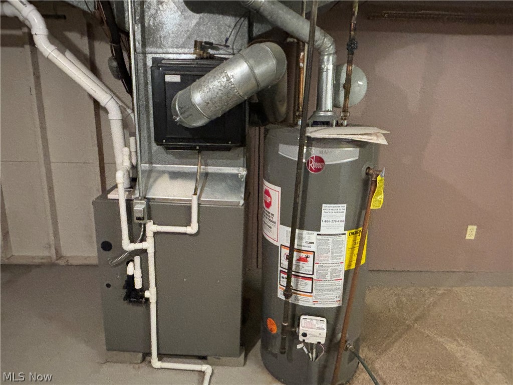 2421 Burbank Road Wooster, OH 44691 - Photo 19 of 23 Utility room with gas water heater