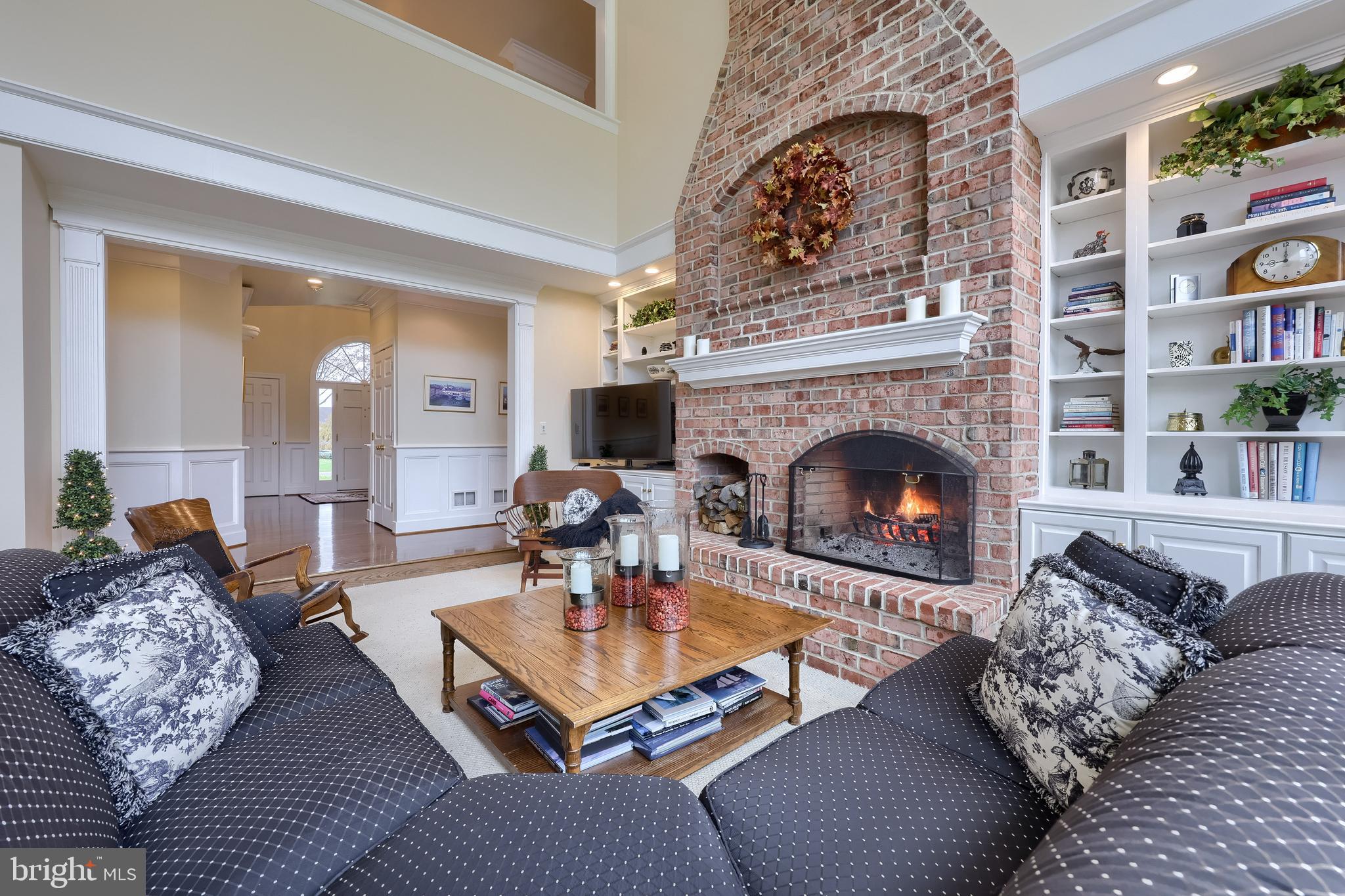 78 Oakhill Drive Lititz, PA 17543 - Photo 25 of 90 a living room with furniture and a fireplace