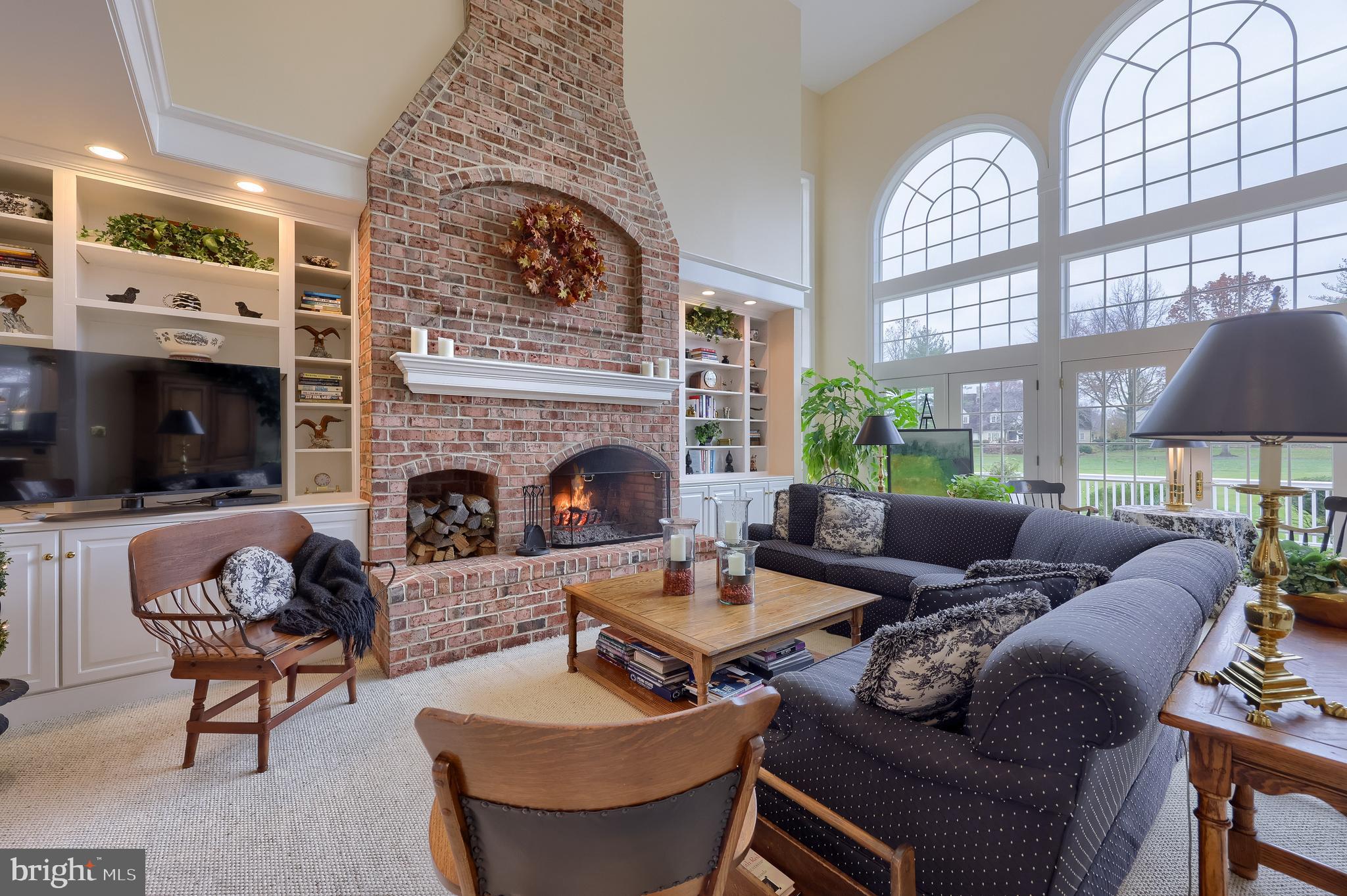 78 Oakhill Drive Lititz, PA 17543 - Photo 28 of 90 a living room with furniture and a fireplace