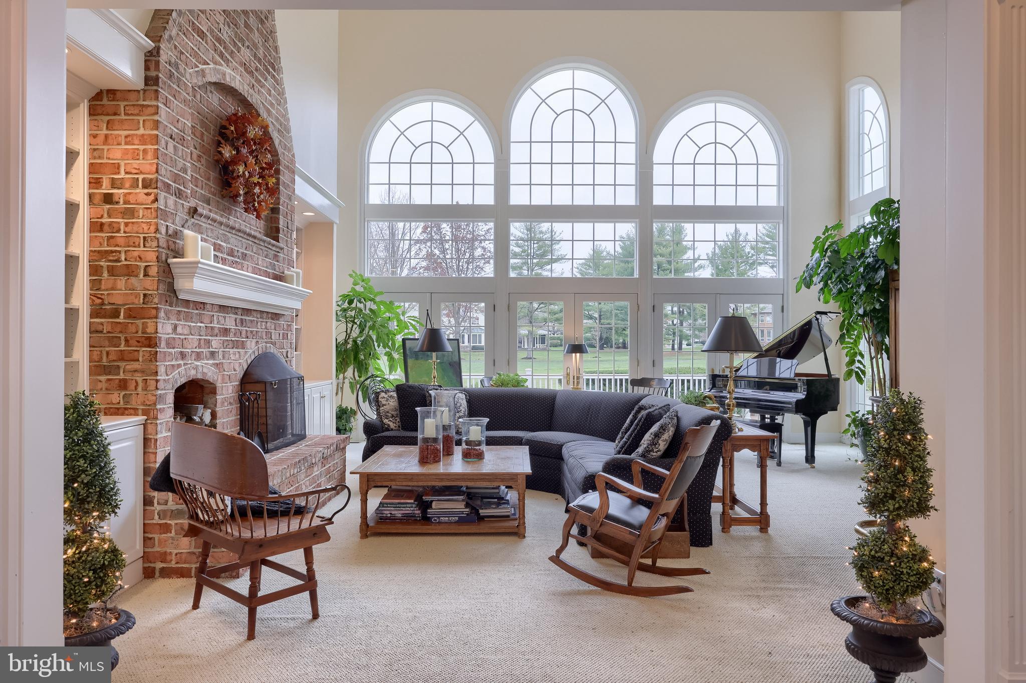 78 Oakhill Drive Lititz, PA 17543 - Photo 31 of 90 a living room with furniture fireplace and a potted plant