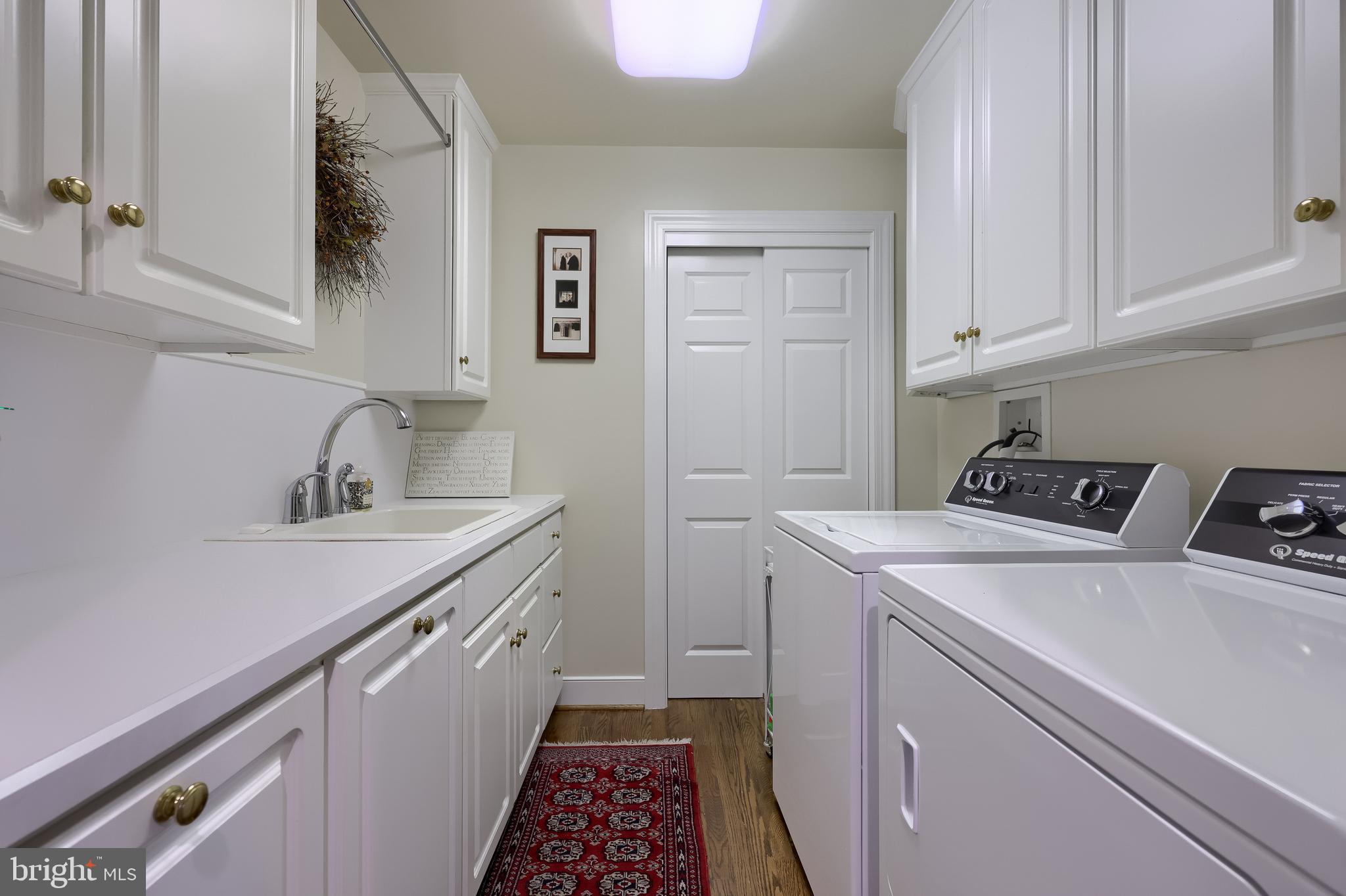 78 Oakhill Drive Lititz, PA 17543 - Photo 37 of 90 a utility room with sink dryer and washer