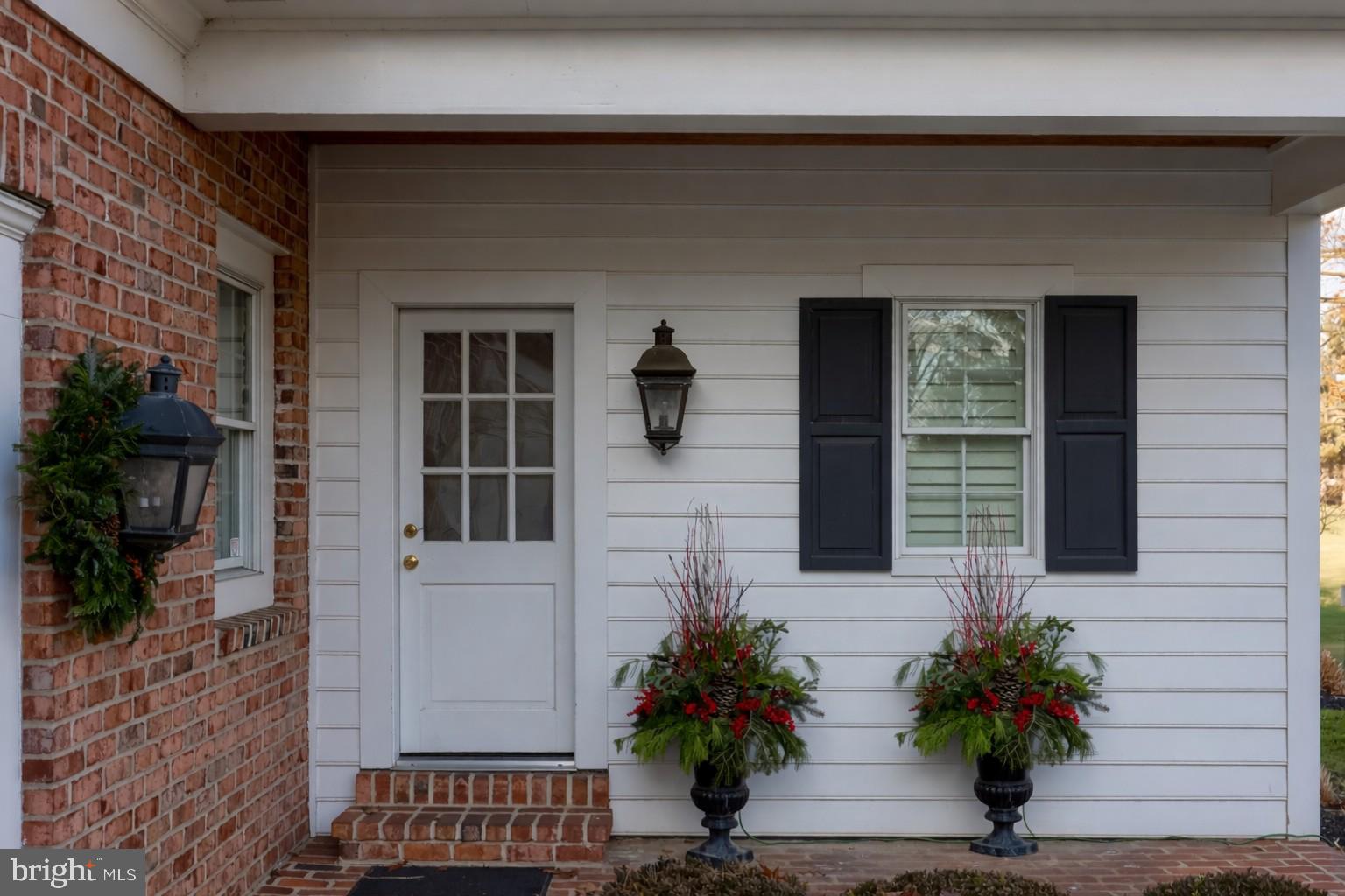 78 Oakhill Drive Lititz, PA 17543 - Photo 65 of 90 a potted plant sitting in front of a house