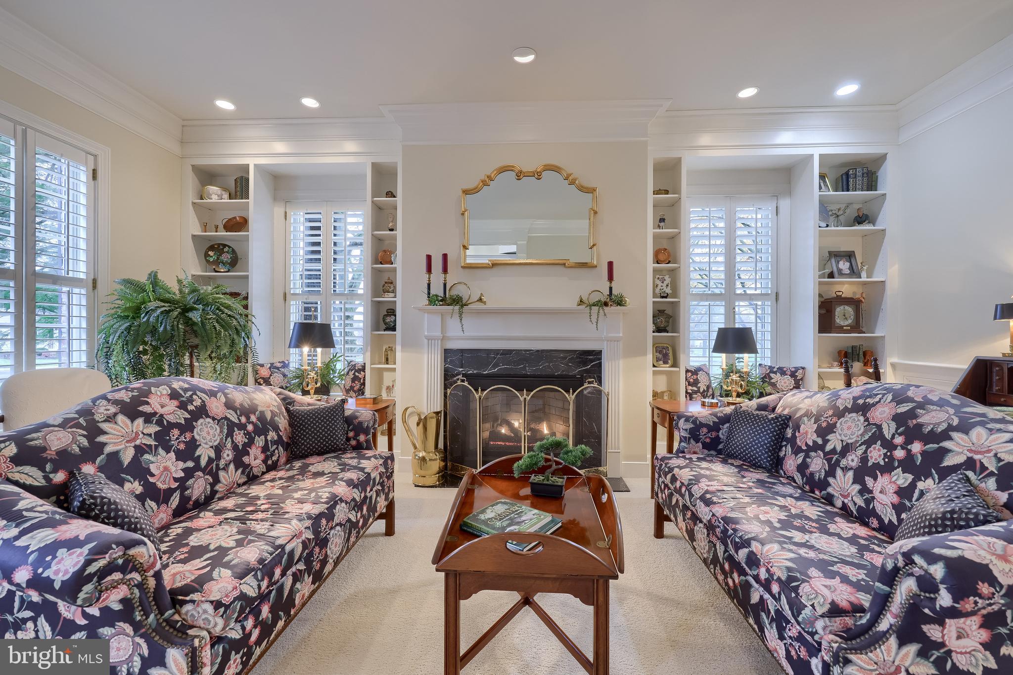 78 Oakhill Drive Lititz, PA 17543 - Photo 7 of 90 a living room with furniture and a fireplace