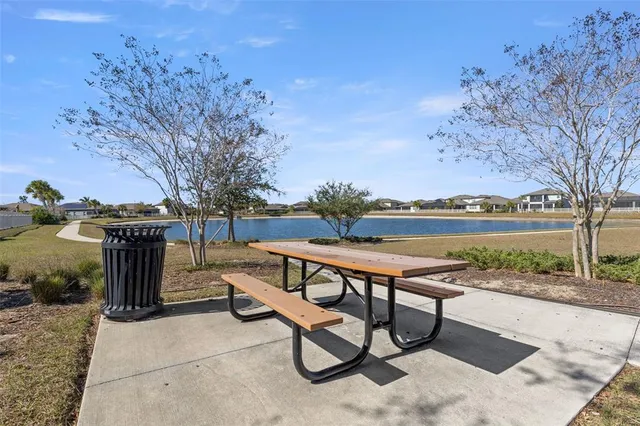 a view of a building with large trees