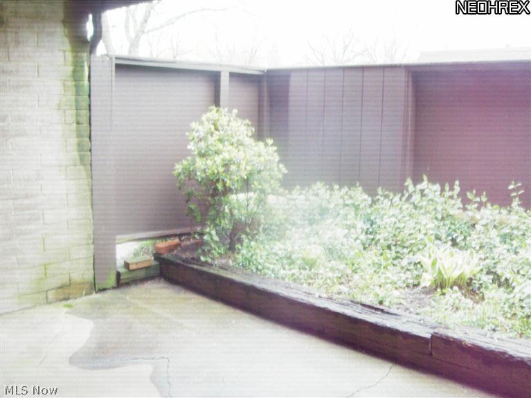 9956 Johnnycake Ridge Road, Unit L3 Painesville, OH 44077 - Photo 6 of 15 Walk out to your private patio area.