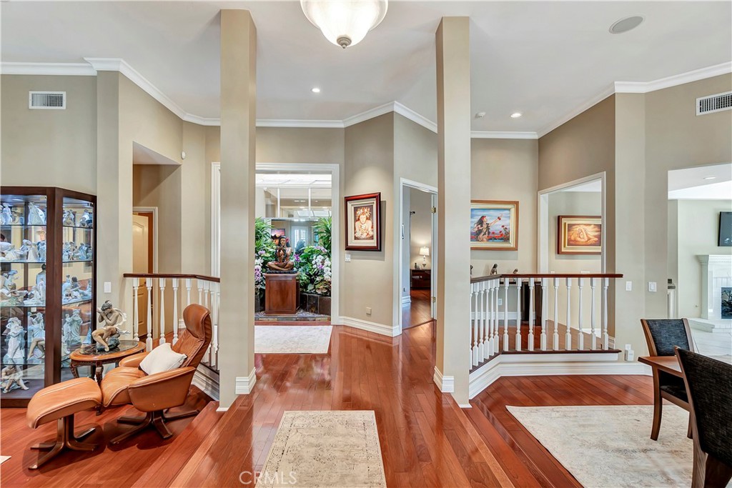 6096 Eaglecrest Drive Huntington Beach, CA 92648 - Photo 11 of 64 a living room with furniture and wooden floor