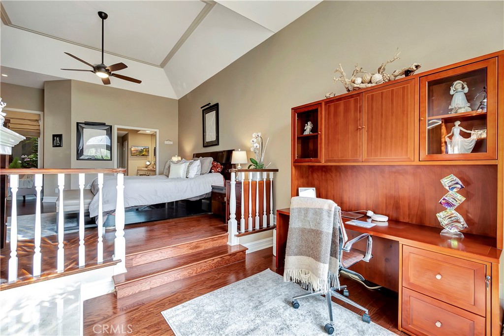 6096 Eaglecrest Drive Huntington Beach, CA 92648 - Photo 31 of 64 a bedroom with furniture and a wooden floor