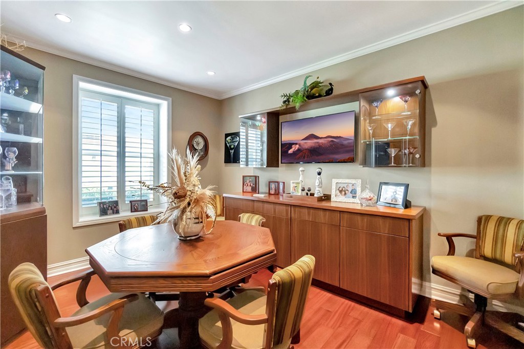 6096 Eaglecrest Drive Huntington Beach, CA 92648 - Photo 41 of 64 a living room with furniture and a flat screen tv