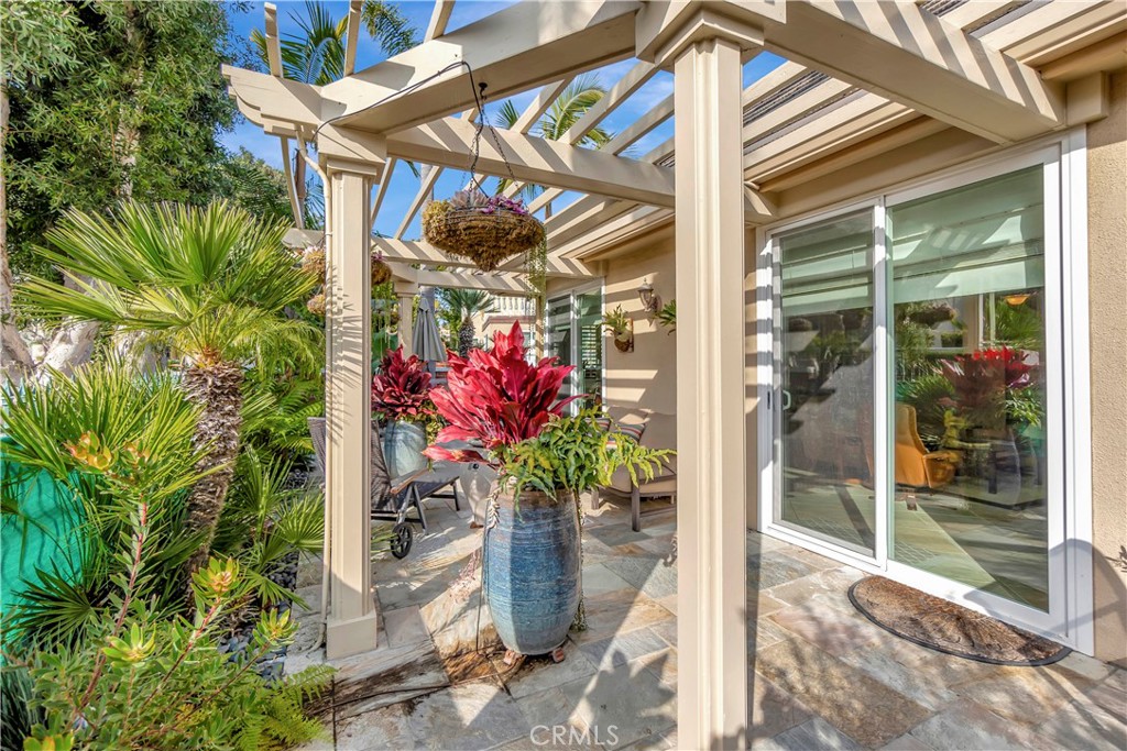 6096 Eaglecrest Drive Huntington Beach, CA 92648 - Photo 51 of 64 a potted plant sitting in front of a house