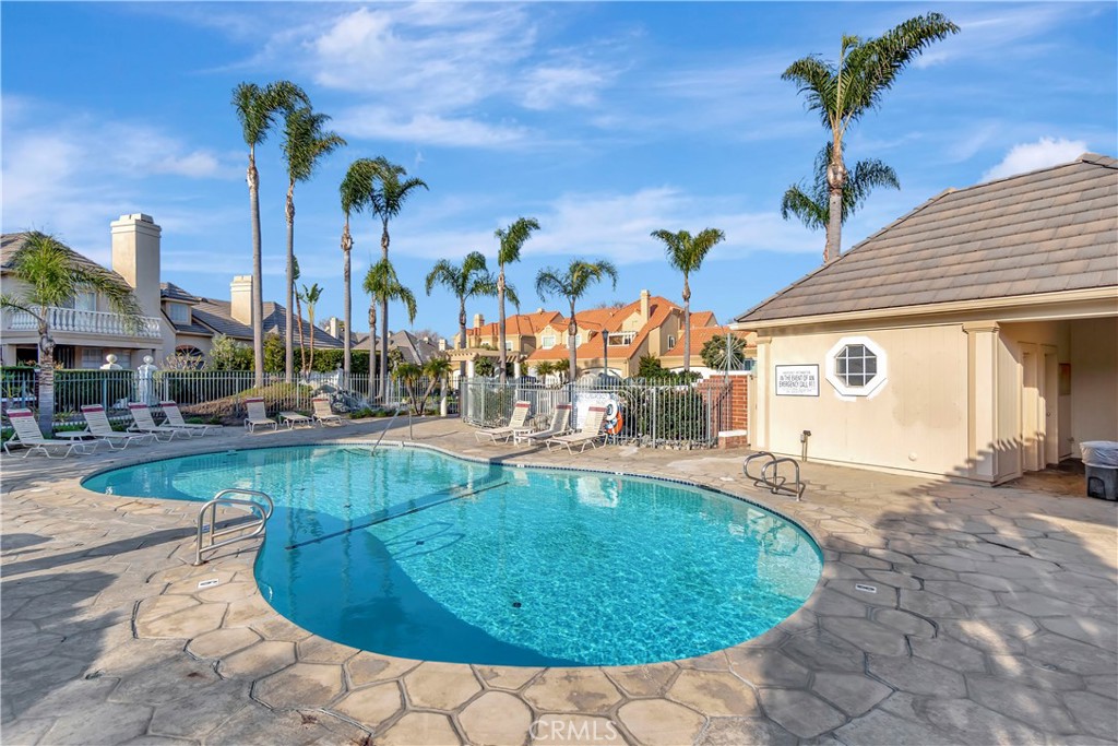 6096 Eaglecrest Drive Huntington Beach, CA 92648 - Photo 64 of 64 a view of a patio with swimming pool