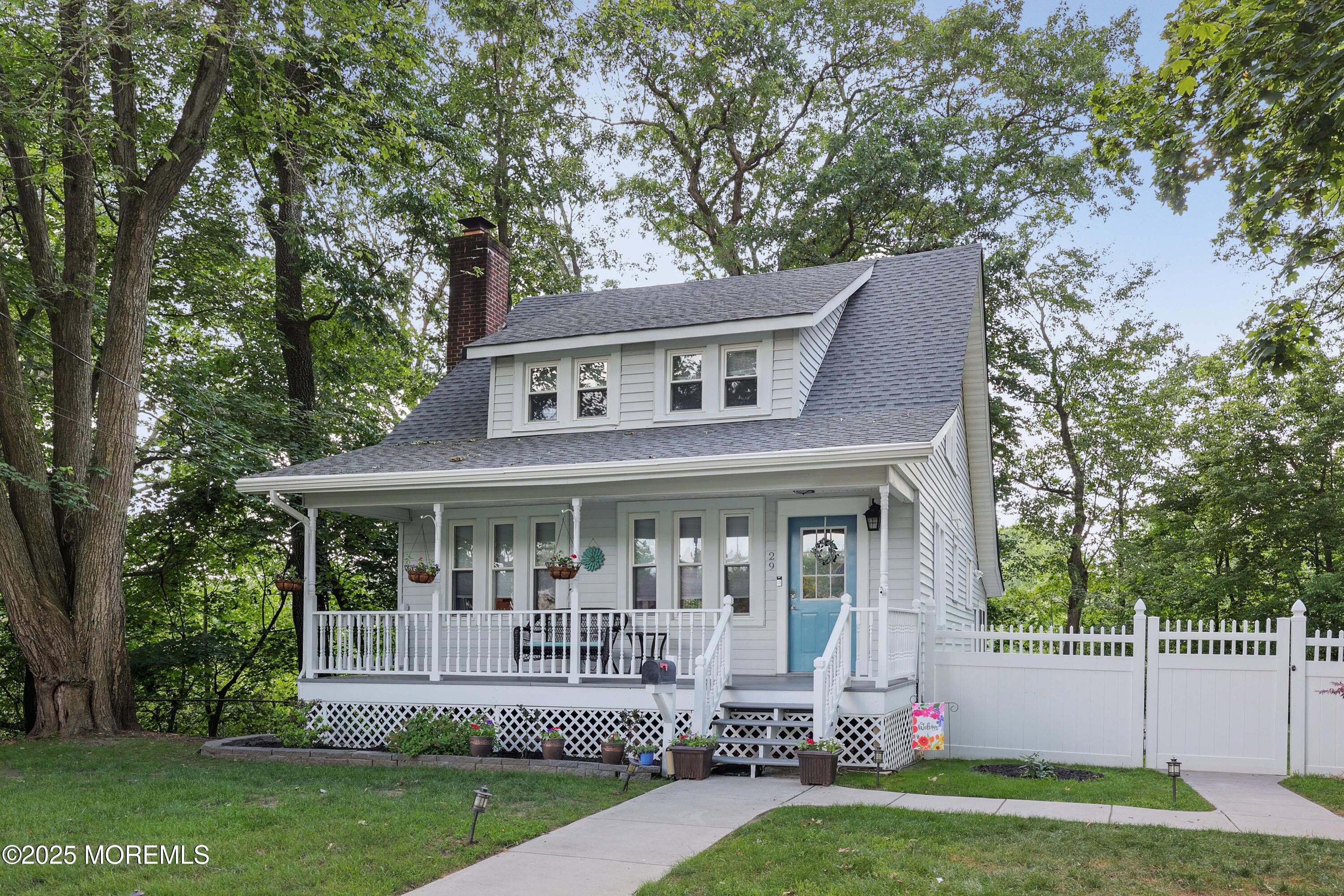 29 Lake Boulevard Matawan, NJ 07747 - Photo 1 of 39 front view of a house with a yard