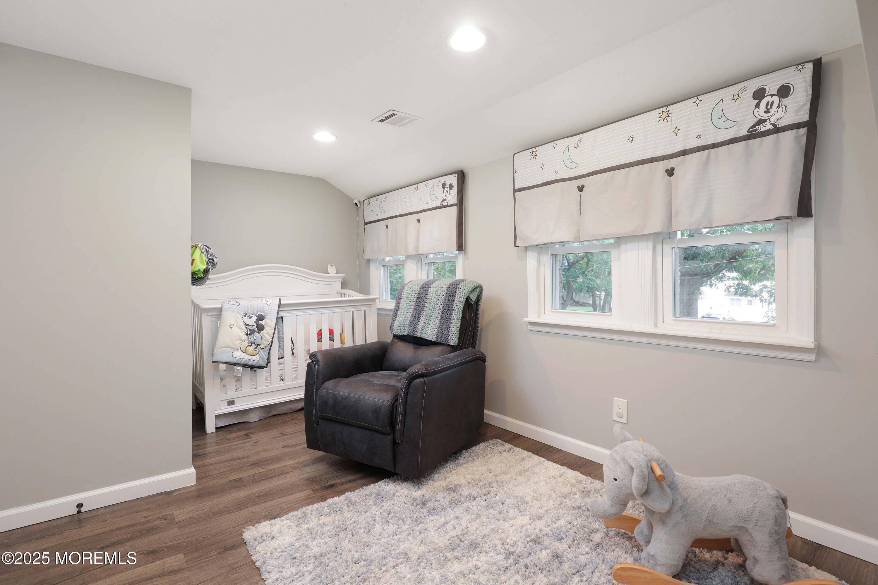29 Lake Boulevard Matawan, NJ 07747 - Photo 20 of 39 a living room with furniture and a window
