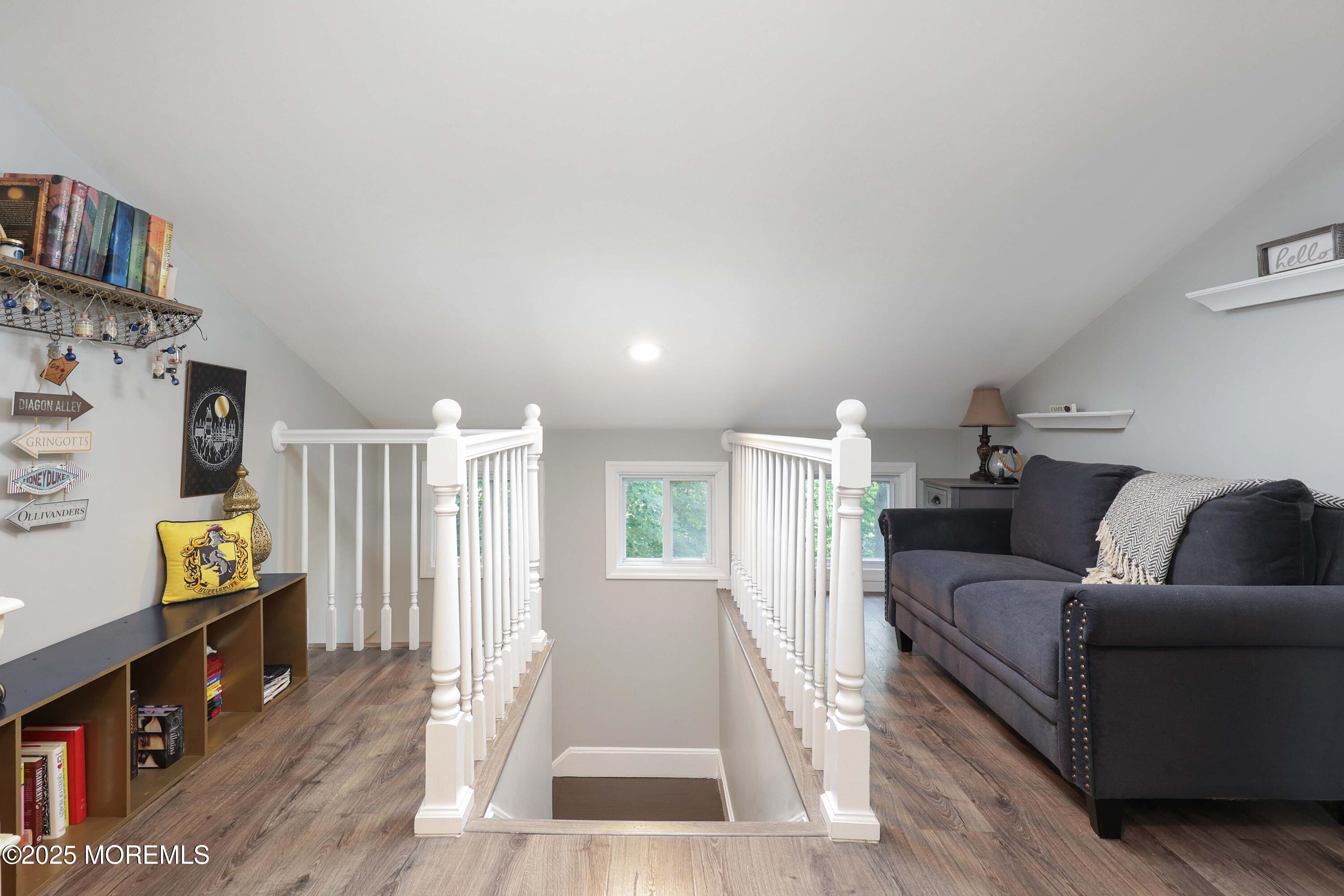29 Lake Boulevard Matawan, NJ 07747 - Photo 21 of 39 a living room with furniture and a flat screen tv