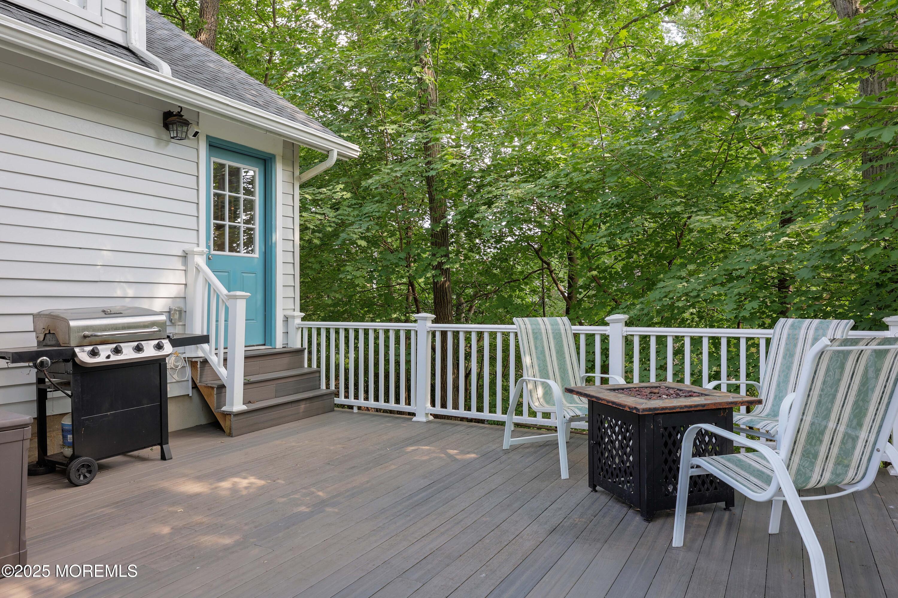 29 Lake Boulevard Matawan, NJ 07747 - Photo 27 of 39 a view of a chair and table on the deck