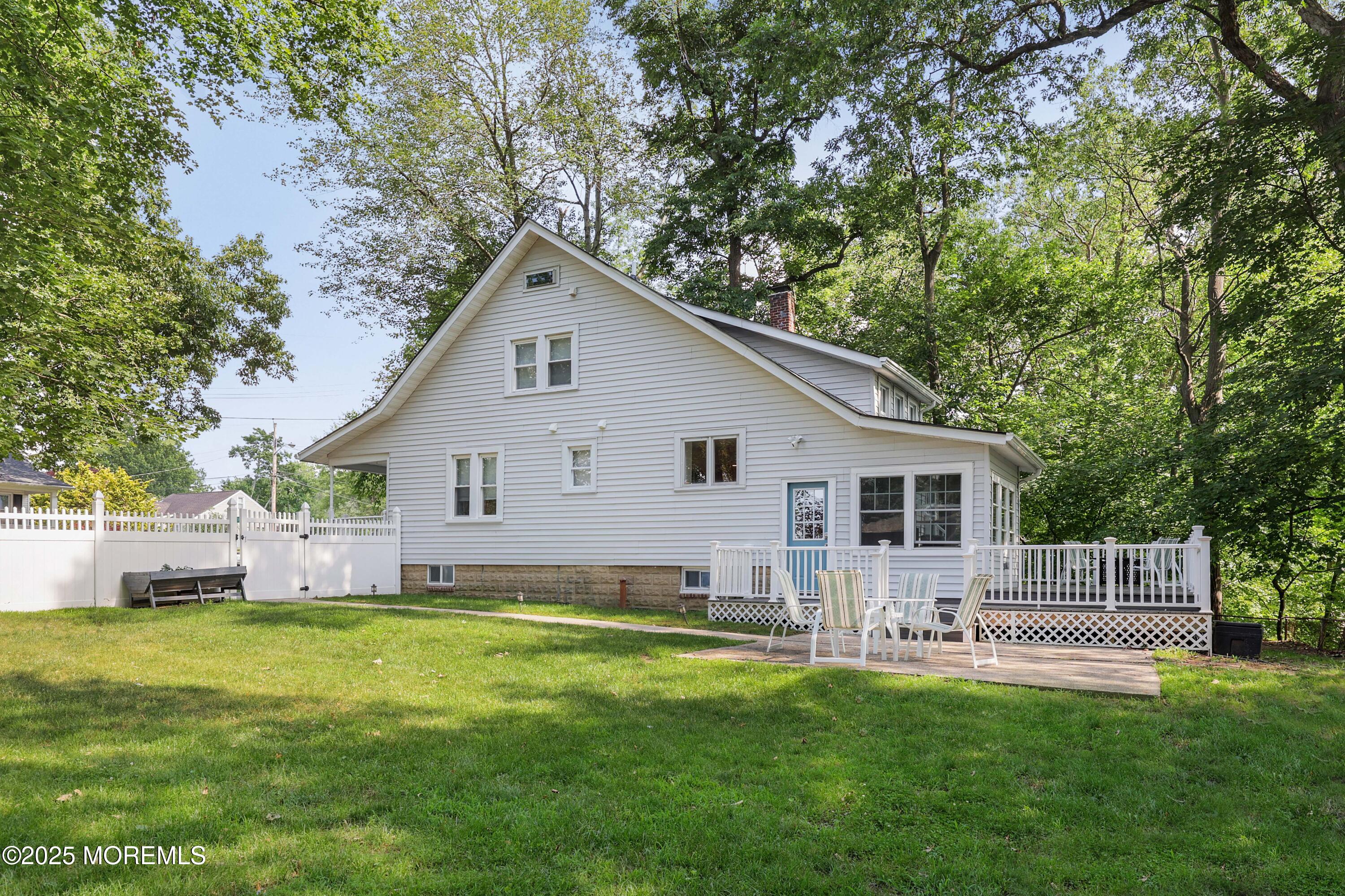 29 Lake Boulevard Matawan, NJ 07747 - Photo 32 of 39 a front view of house with yard and green space