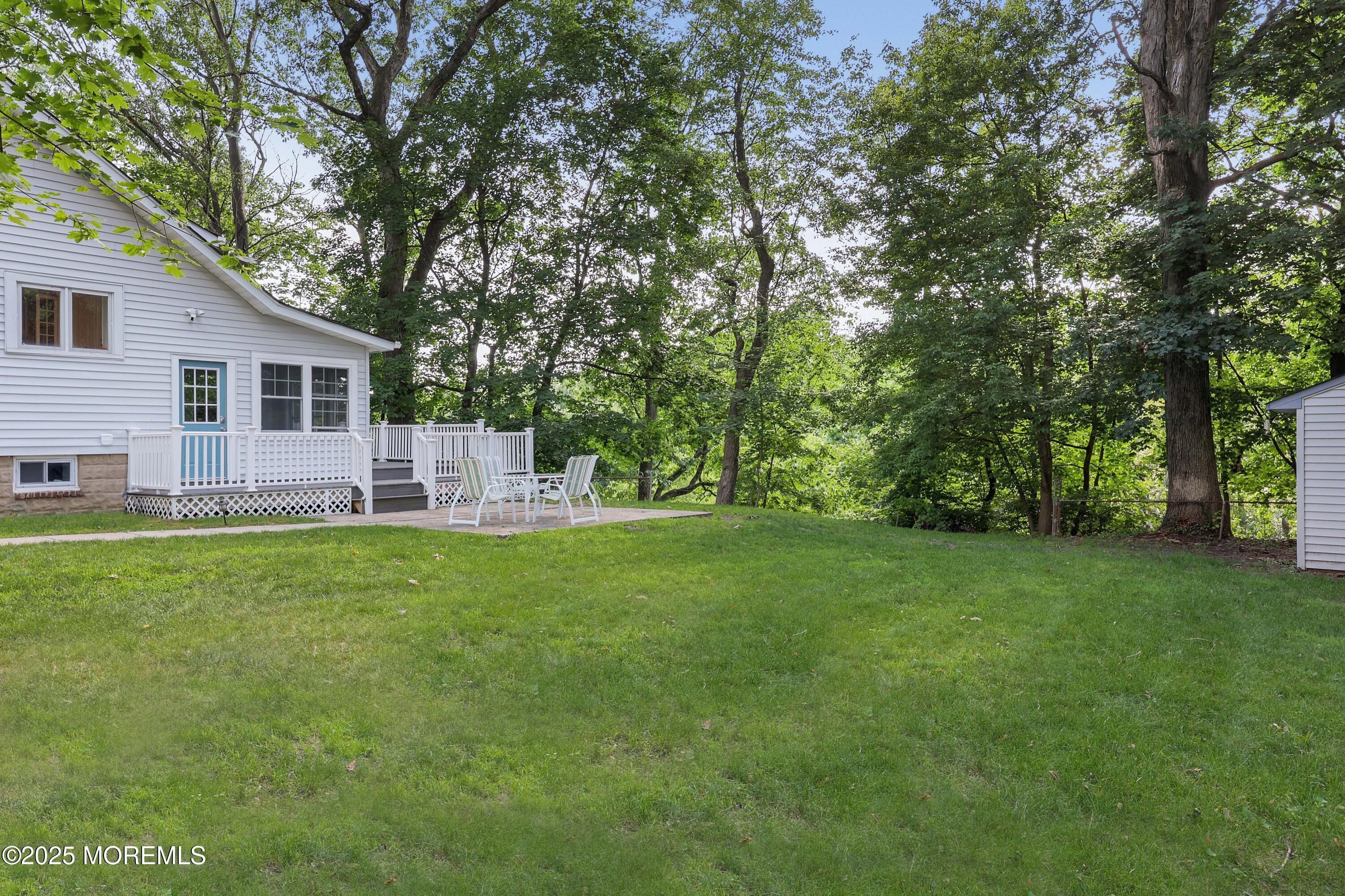 29 Lake Boulevard Matawan, NJ 07747 - Photo 33 of 39 a view of a house with backyard and garden