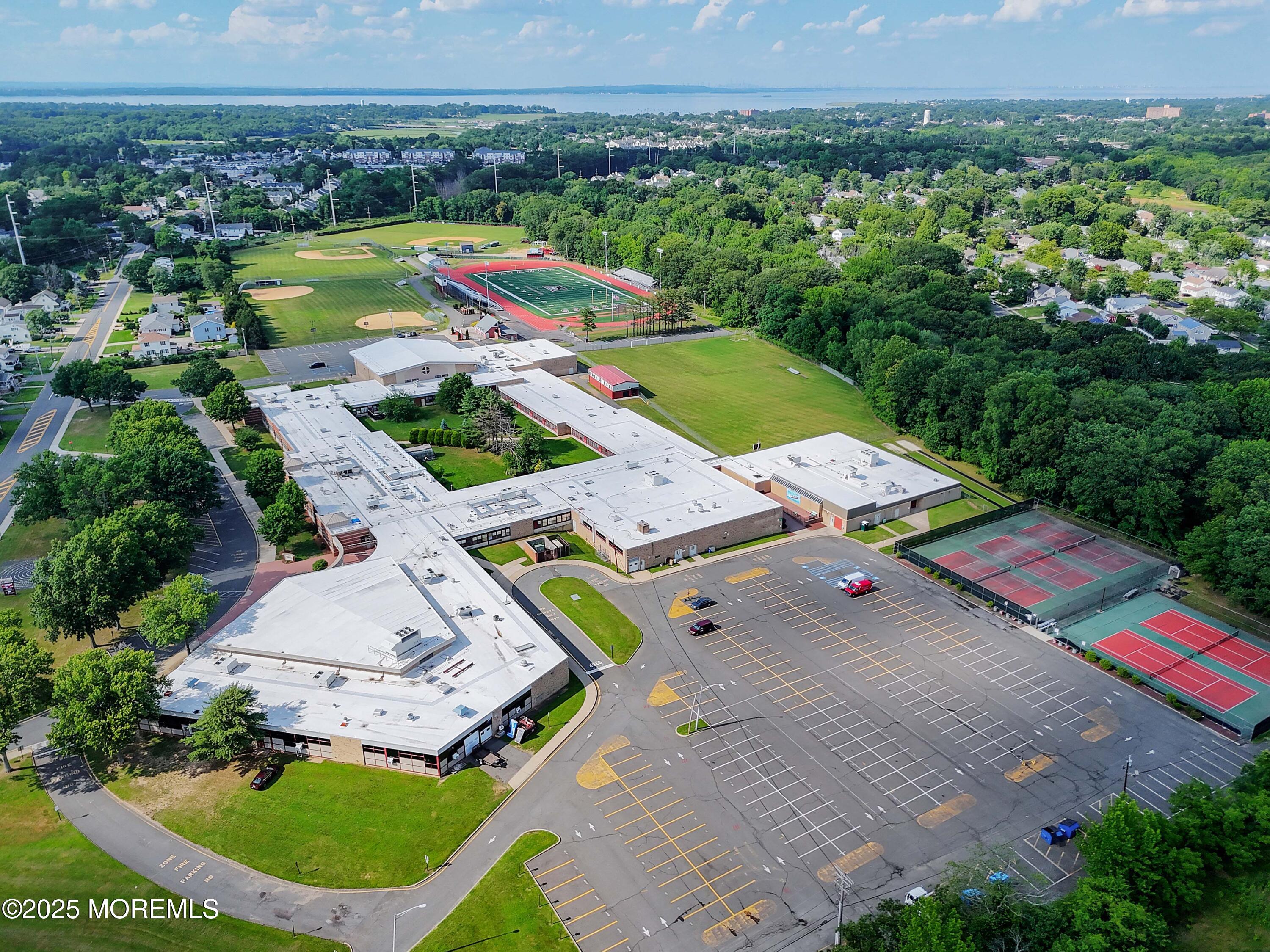29 Lake Boulevard Matawan, NJ 07747 - Photo 38 of 39 an aerial view of residential houses with outdoor space and pool