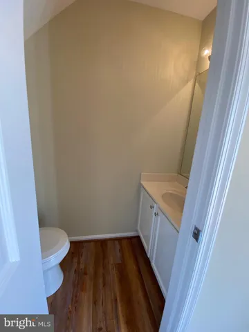 a bathroom with a sink and toilet