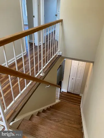 a bathroom with a sink toilet and mirror