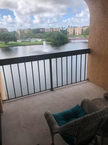 a view of a chair in a balcony