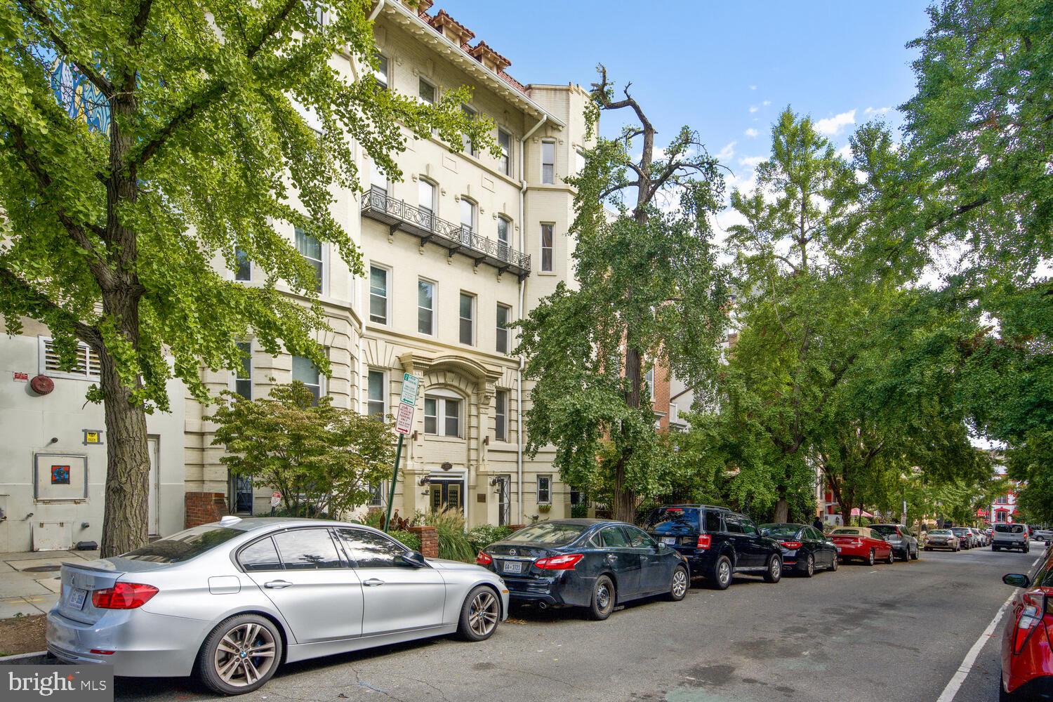 1831 Belmont Road Northwest, Unit 201 Washington, DC 20009 - Photo 11 of 11 a view of a cars park in front of a building
