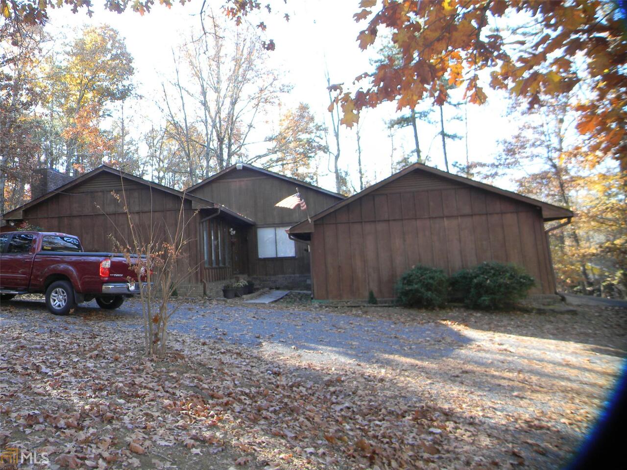 306 Armuchee Trail Northeast Rome, GA 30165 - Photo 1 of 1 a front view of a house with a yard and garage