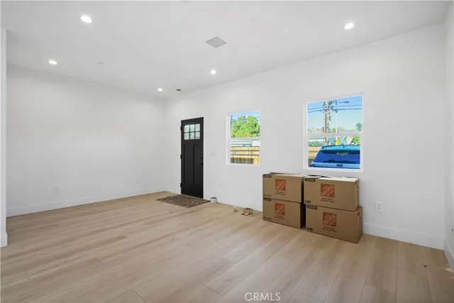 a room with furniture and a window