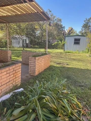 a view of a garden with a bench