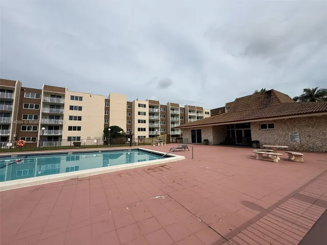 a view of roof deck with a yard
