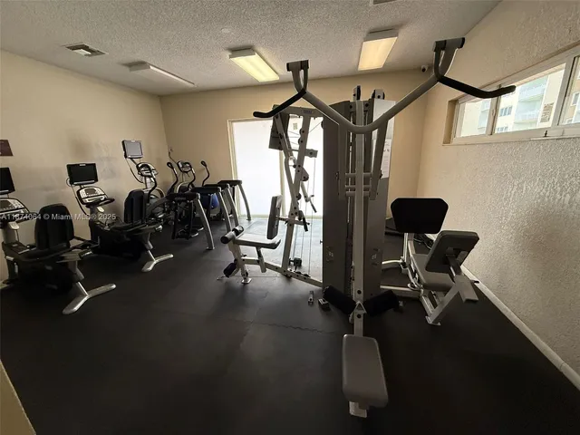 a view of a room with gym equipment