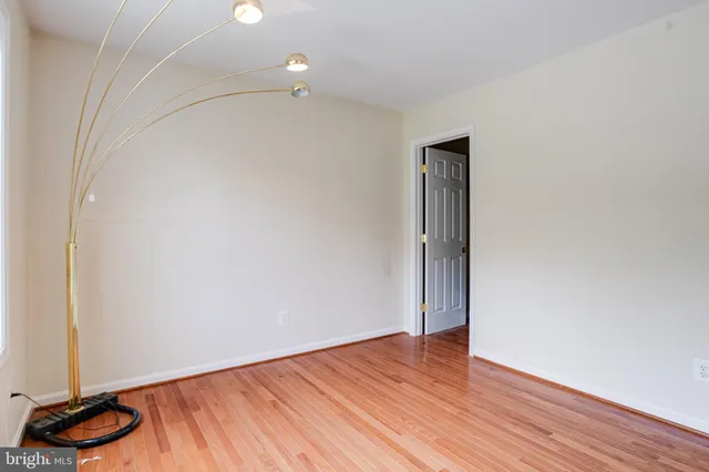 a view of a lake with houses in the back