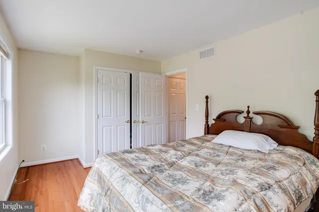 a view of a lake with chairs