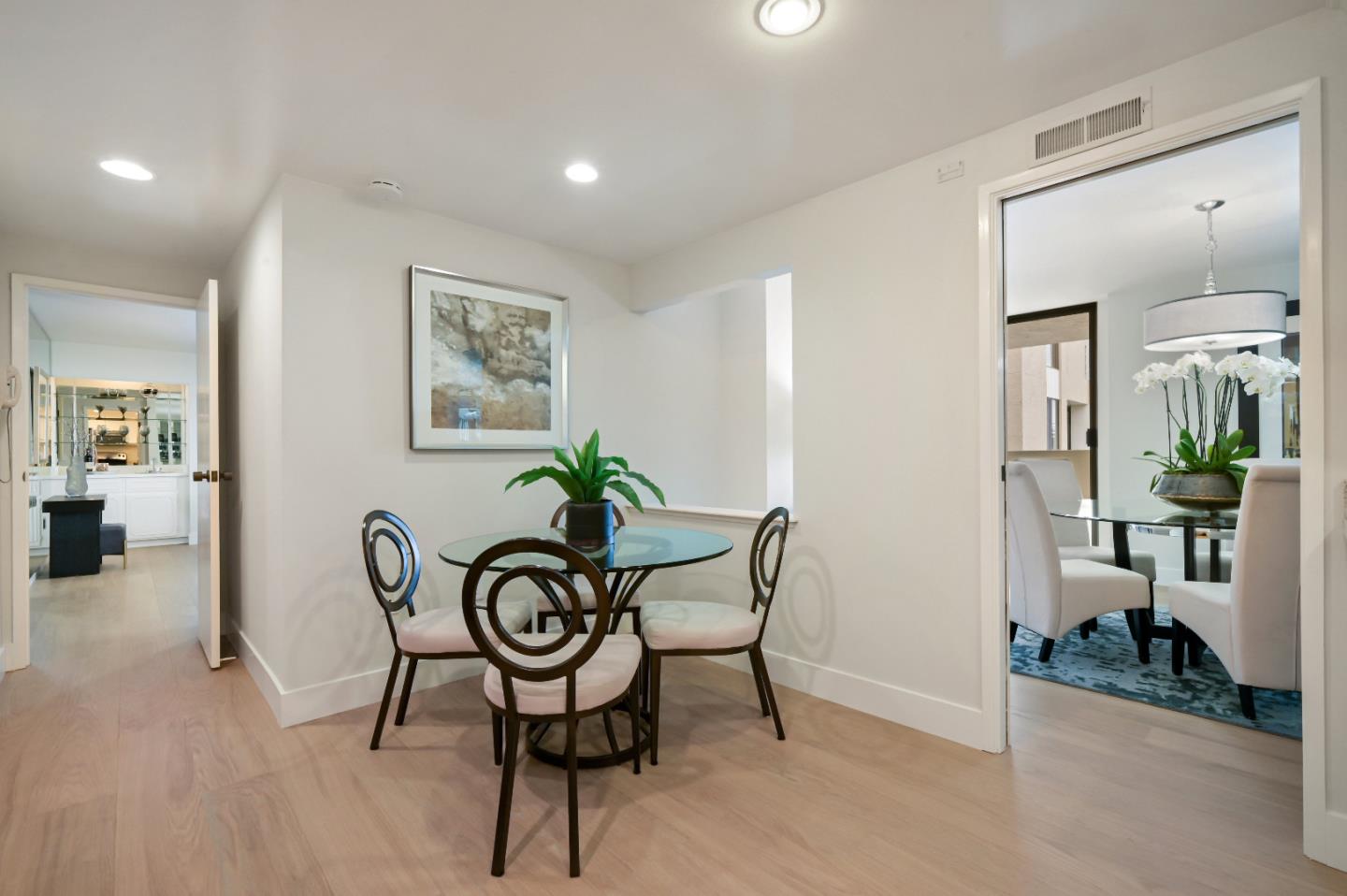 110 Park Road, Unit 502 Burlingame, CA 94010 - Photo 14 of 43 a view of a room with furniture and wooden floor