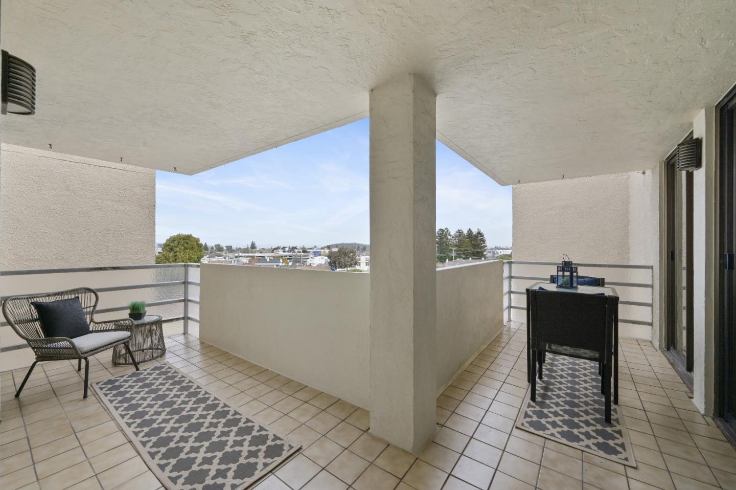 110 Park Road, Unit 502 Burlingame, CA 94010 - Photo 17 of 43 a view of a chairs and table in a balcony
